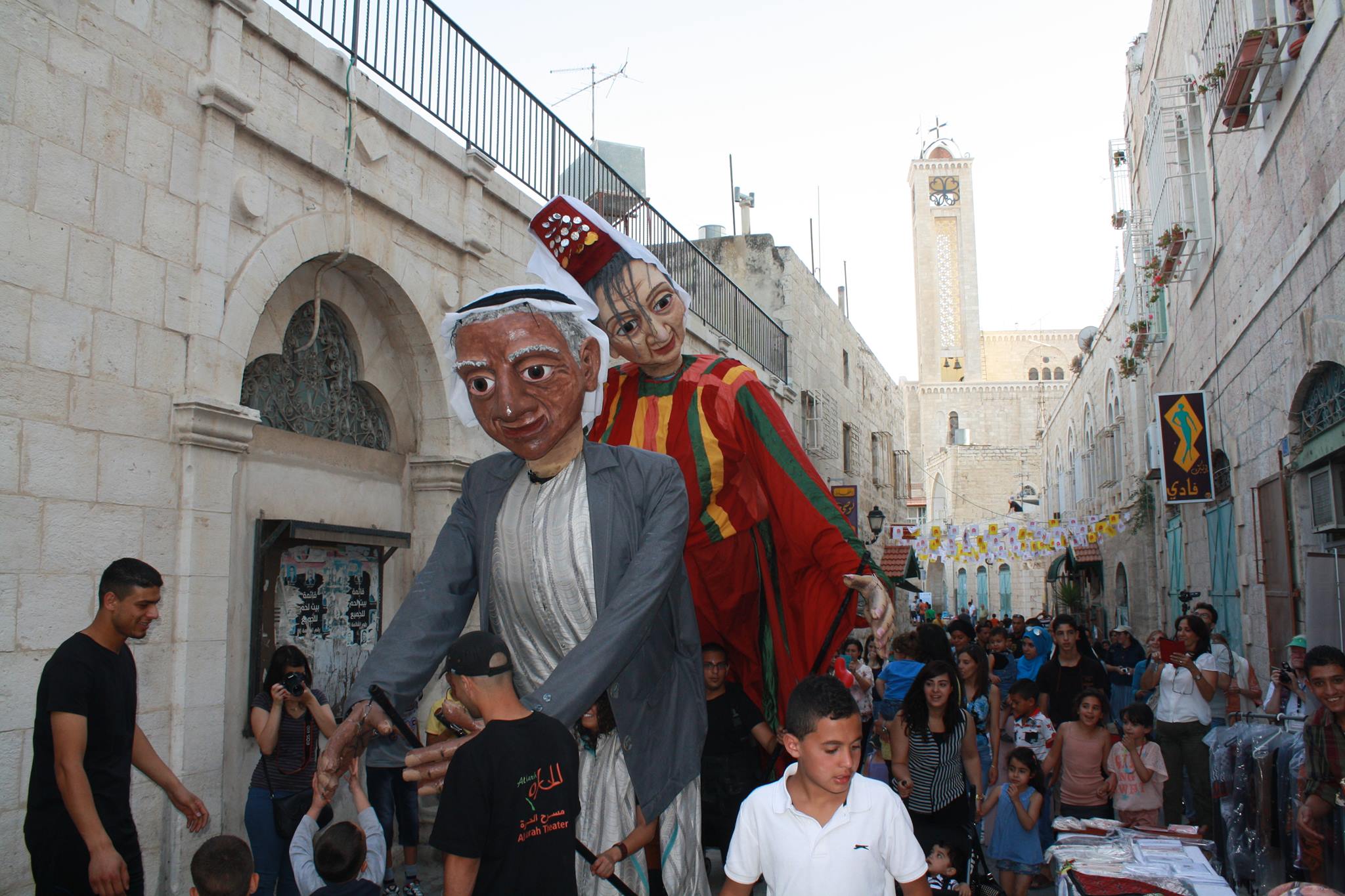 In photos Bethlehem festival draws thousands to Old City Alex Shams